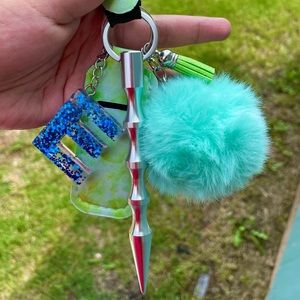 Self defense keychain/wristlet less fuller one